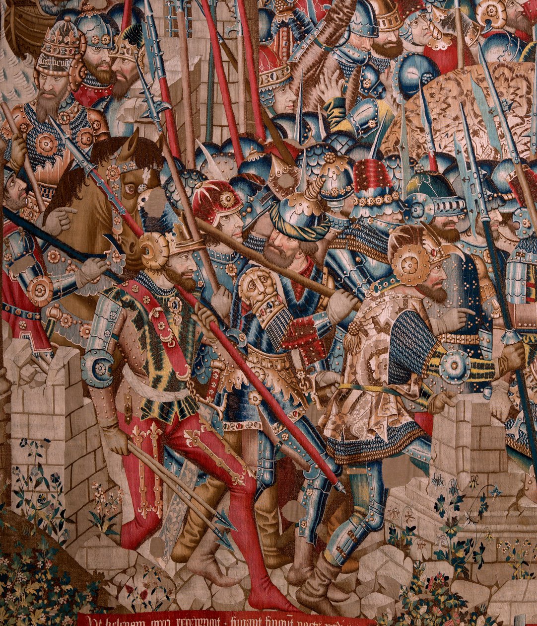 flamsk gobelin. Serien Den trojanske krig. Ødelæggelsen af Troja (Destrucción de Troya). Elvte gobelin i serien. Model Coëtivy Master (Henry eller Conrard de Vulcop). Fremstiller Tournai-værksteder. Ca 1470. Stof Uld og silke, 6/7 kæder pr. cm. af Flemish School