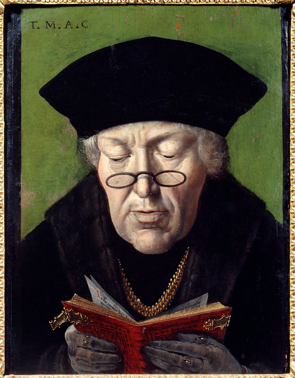 Portræt af Thomas More (1478-1535), humanist. Humanisten er repræsenteret med briller ved at læse en bog. Maleri af den flamske skole af Flemish School