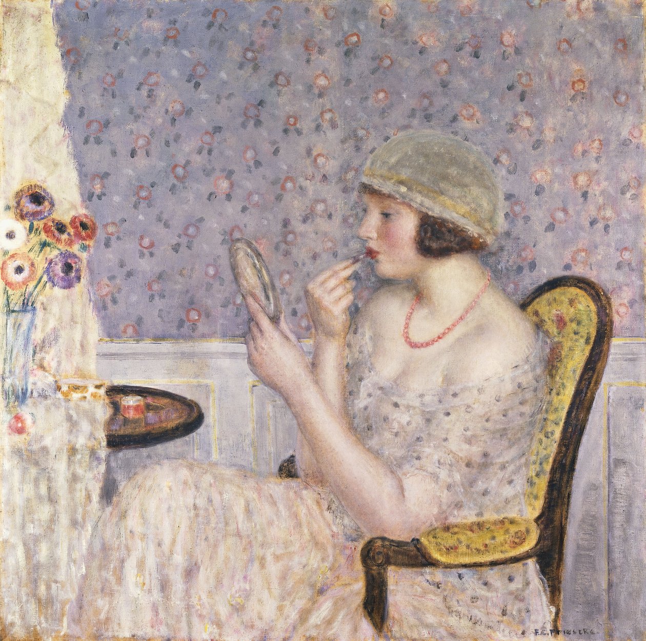 Kvinde ved et toiletbord af Frederick Carl Frieseke