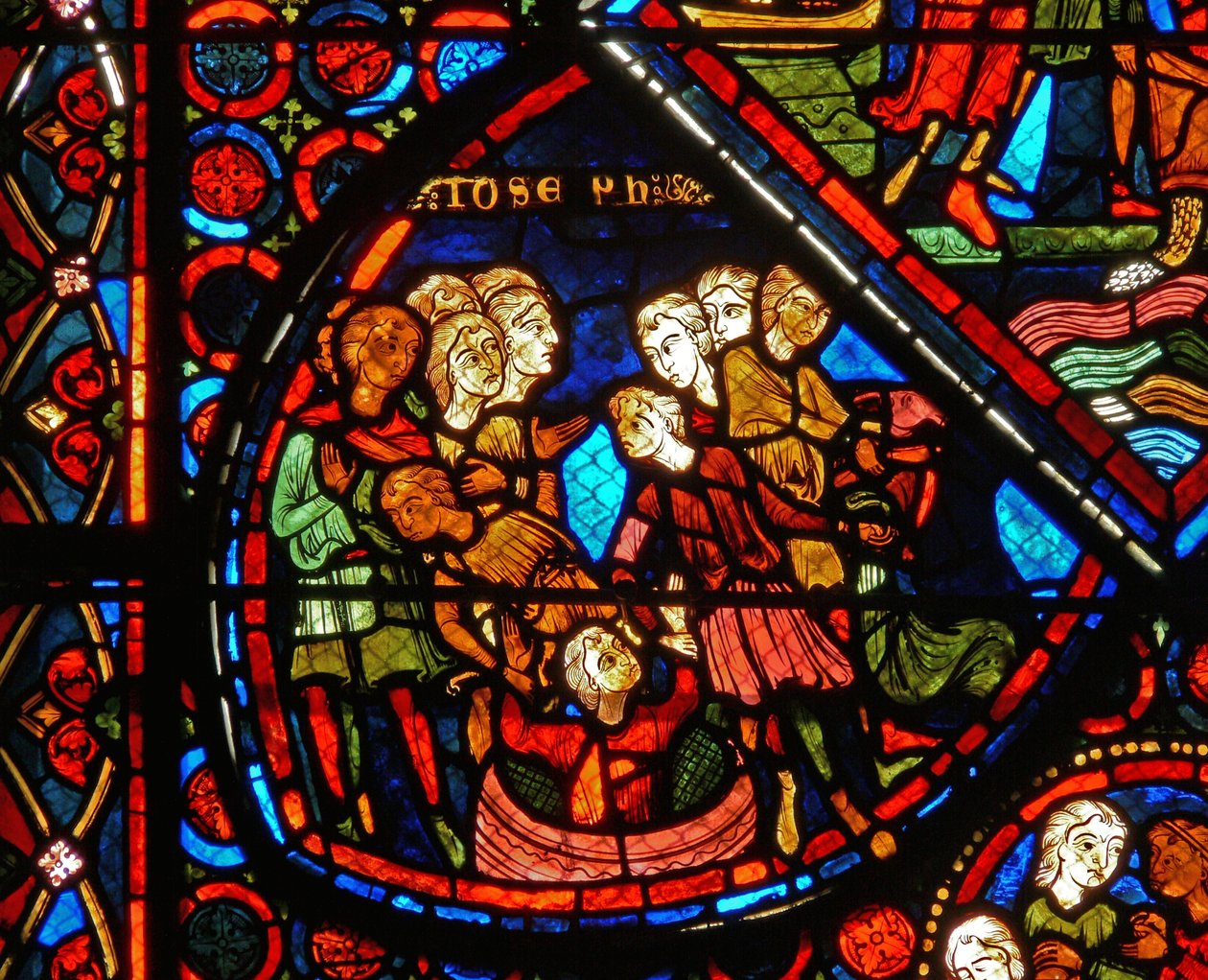 Detalje fra et vindue, der viser scener fra historien om Joseph af French School