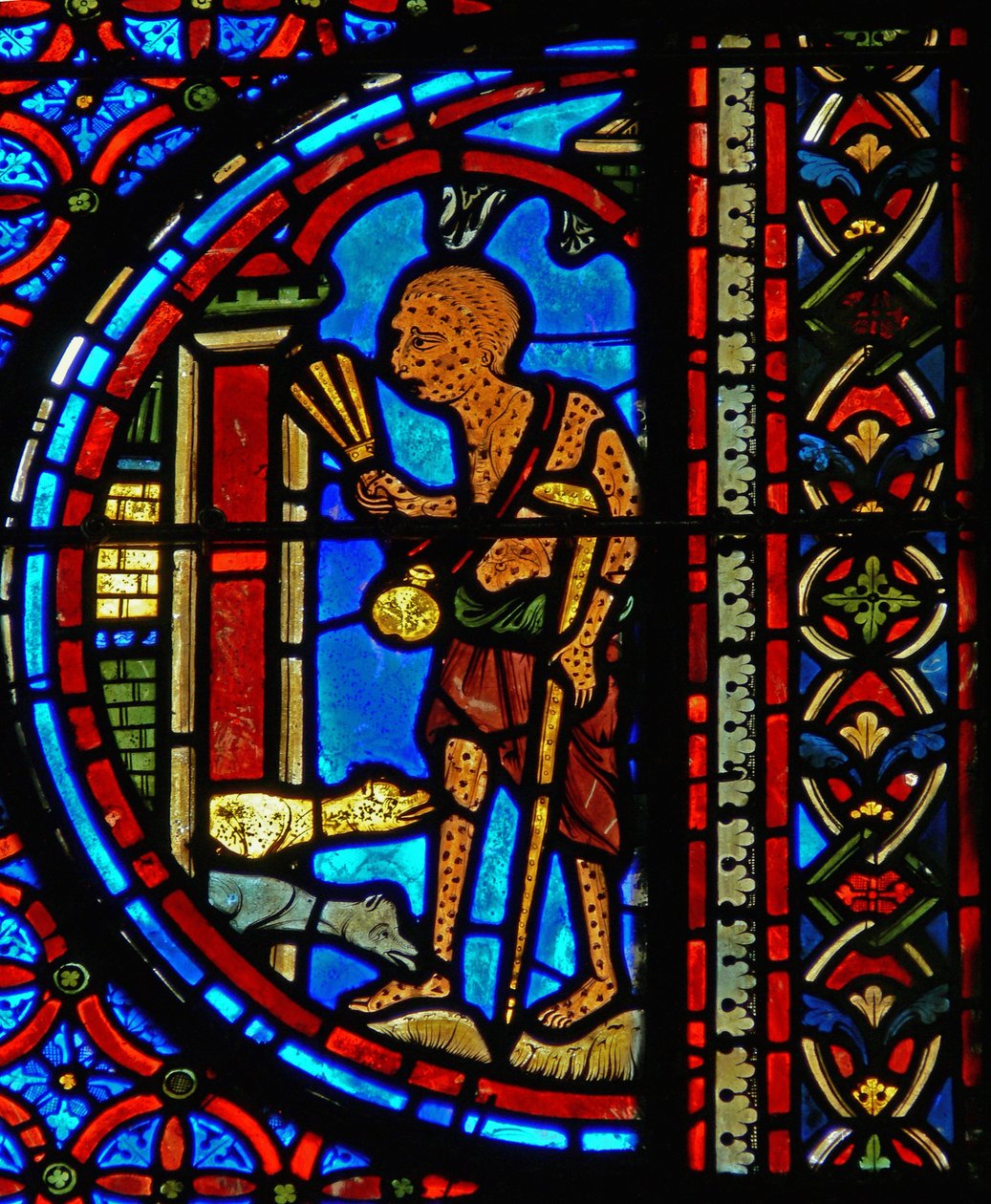 Detalje fra et vindue, der viser lignelsen om Lazarus og dyk af French School