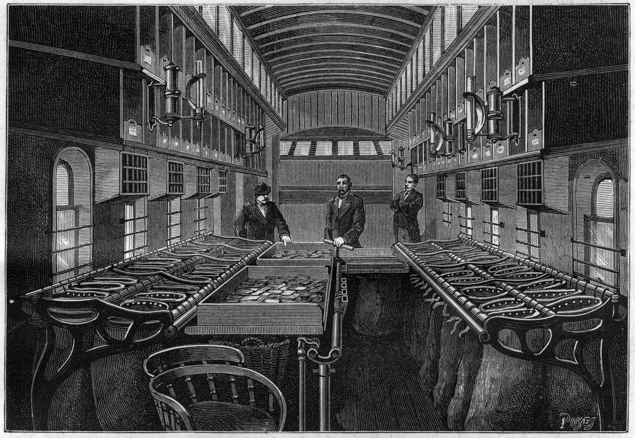 Inde i et mobilt posthus i USA, med borde og mobile skabe til sortering og klassificering af varer. Indgravering i "" La Nature. Revue des sciences et de ses applications aux arts et à l