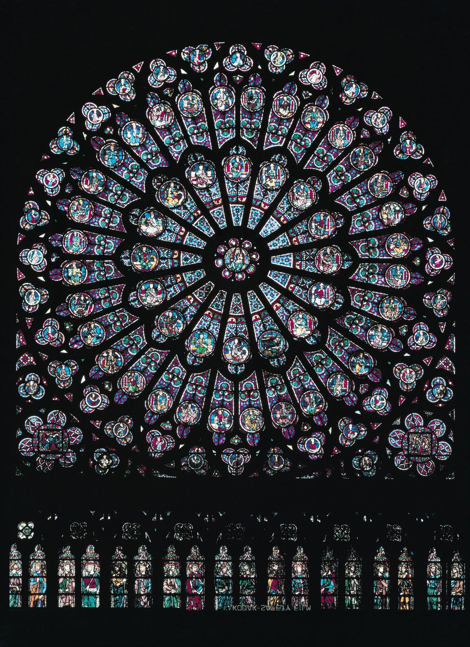 Det nordlige tværarms rosenvindue forestiller jomfruen og barnet i midten omgivet af gammeltestamentlige tegn, ca. 1250 af French School