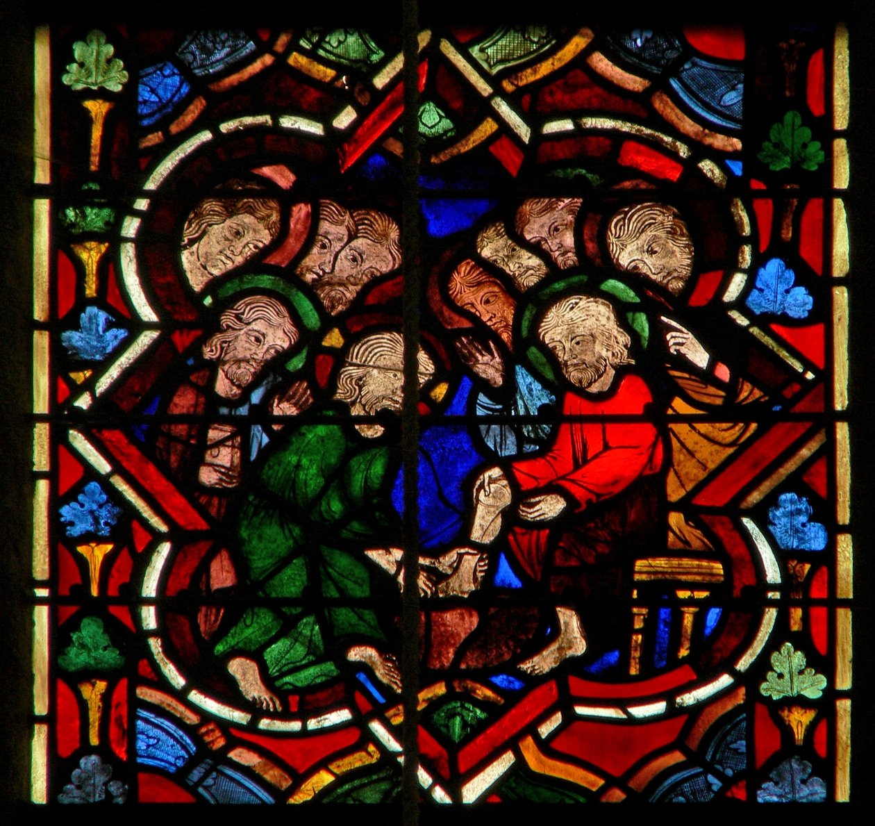 Scene i E-vinduet, der viser Kristus vasker sine disciples fødder af French School