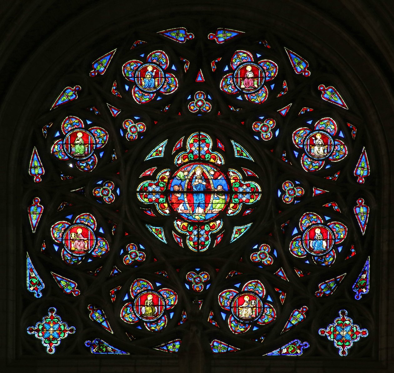 Sydrosenvinduet med Jomfru Marias himmelfart. (moderne glas; stenværk C15 og C20) af French School