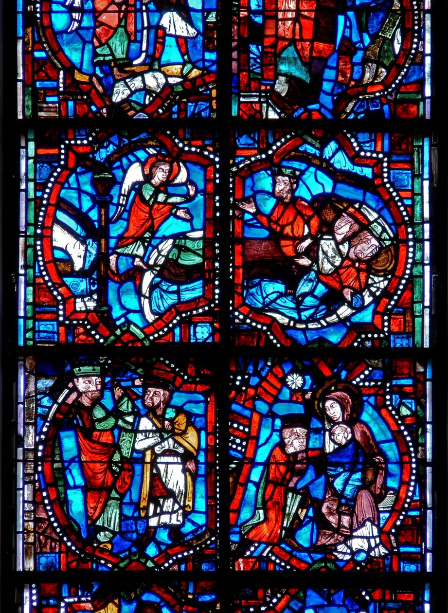 Vindue, der afbilder scener fra Kristi barndom, inklusive magi, der bliver advaret i søvne, og magi med jomfru og barn af French School