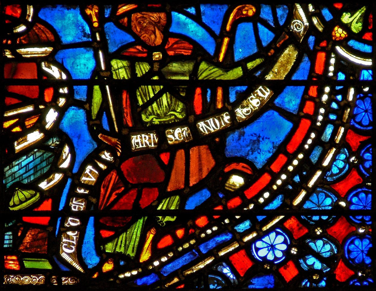 Vindue w9, der forestiller Farao, der holder en banderole med ordene I Clement of Chartres lavede dette vindue (i Joseph-vinduet) af French School