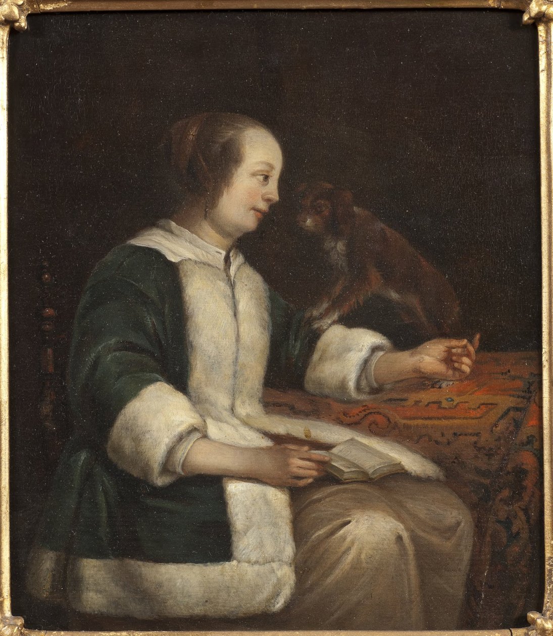 Portræt af en dame med en hund af Gabriel Metsu