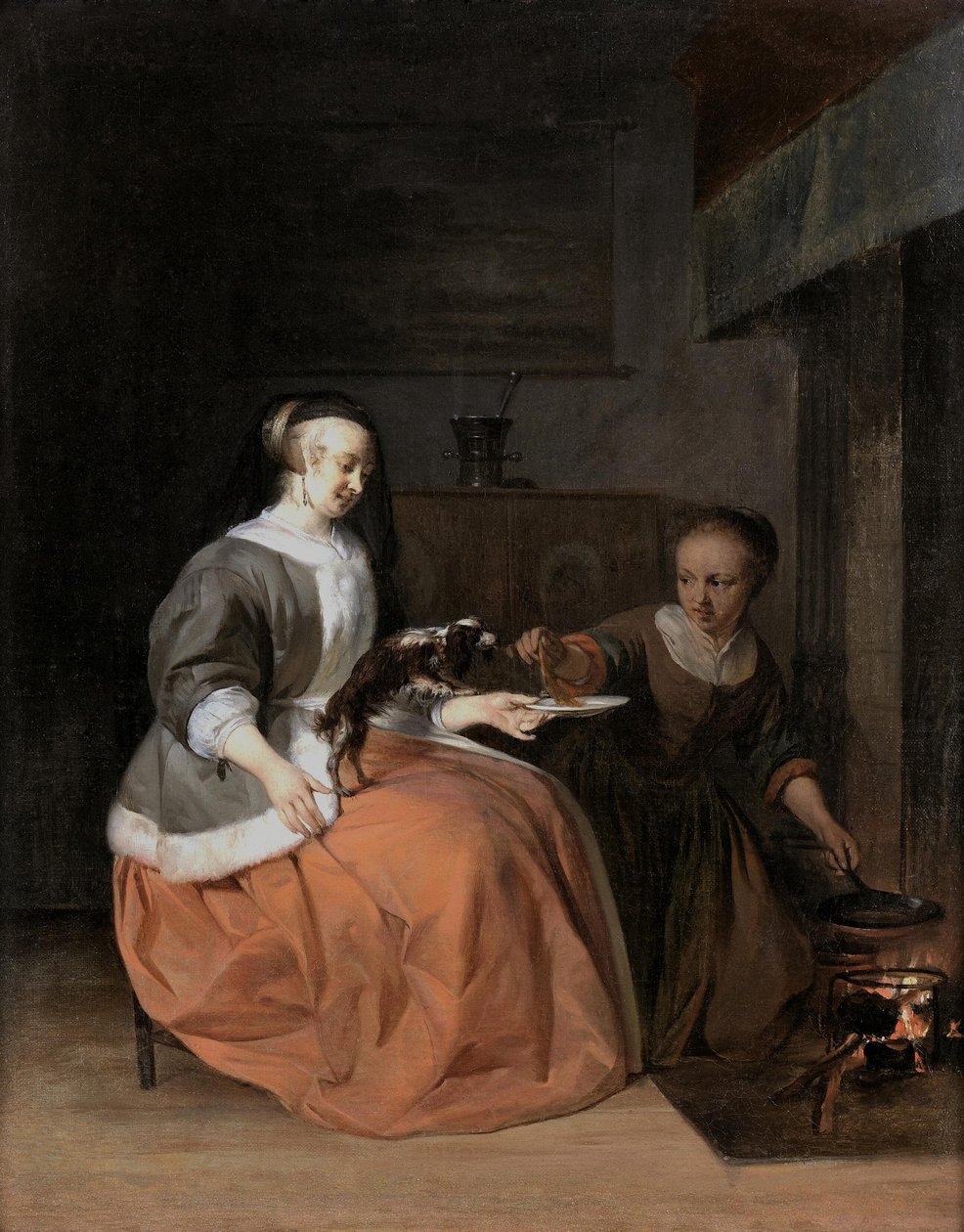 Ung kvinde og tjenestepige fodrer en hund med en pandekage af Gabriel Metsu
