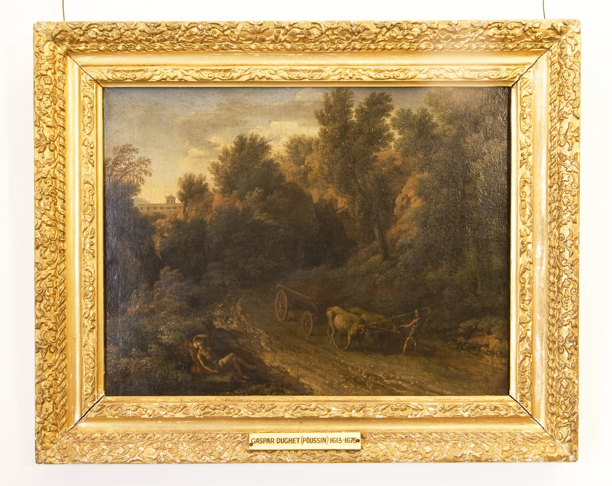 Et klassisk landskab med oksevogn og figurer af Gaspard Poussin Dughet