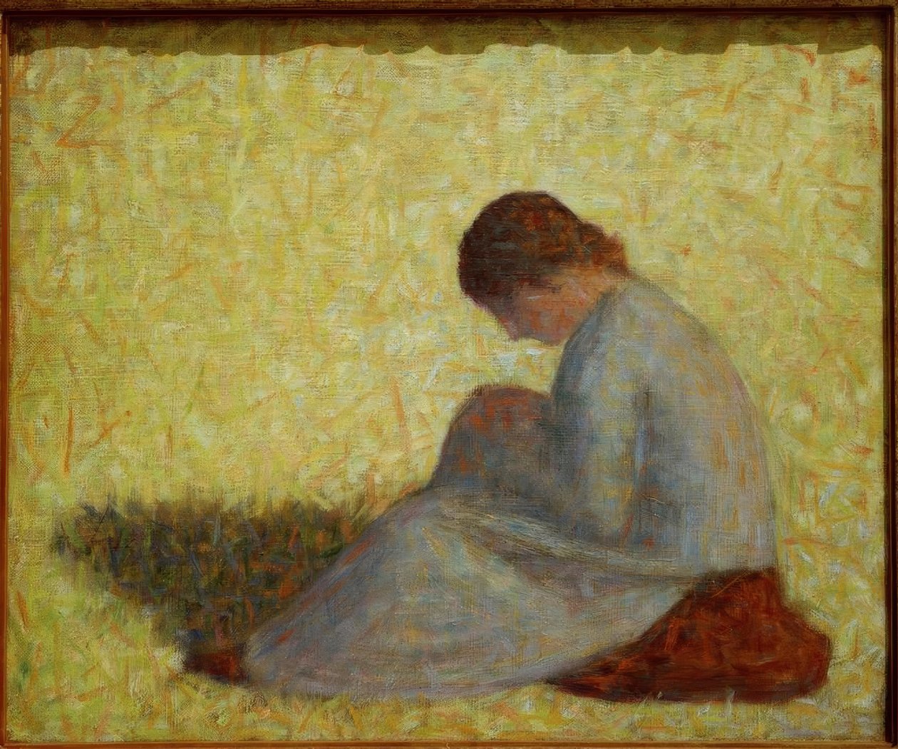 Bondekvinde sidder i græsset af Georges Seurat