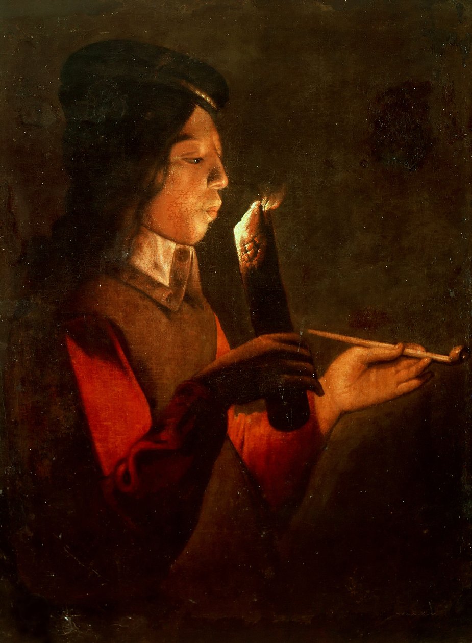 En ung dreng med en pibe, der blæser på en ildsjæl Le Souffleur à la pibe. af Georges de, La Tour