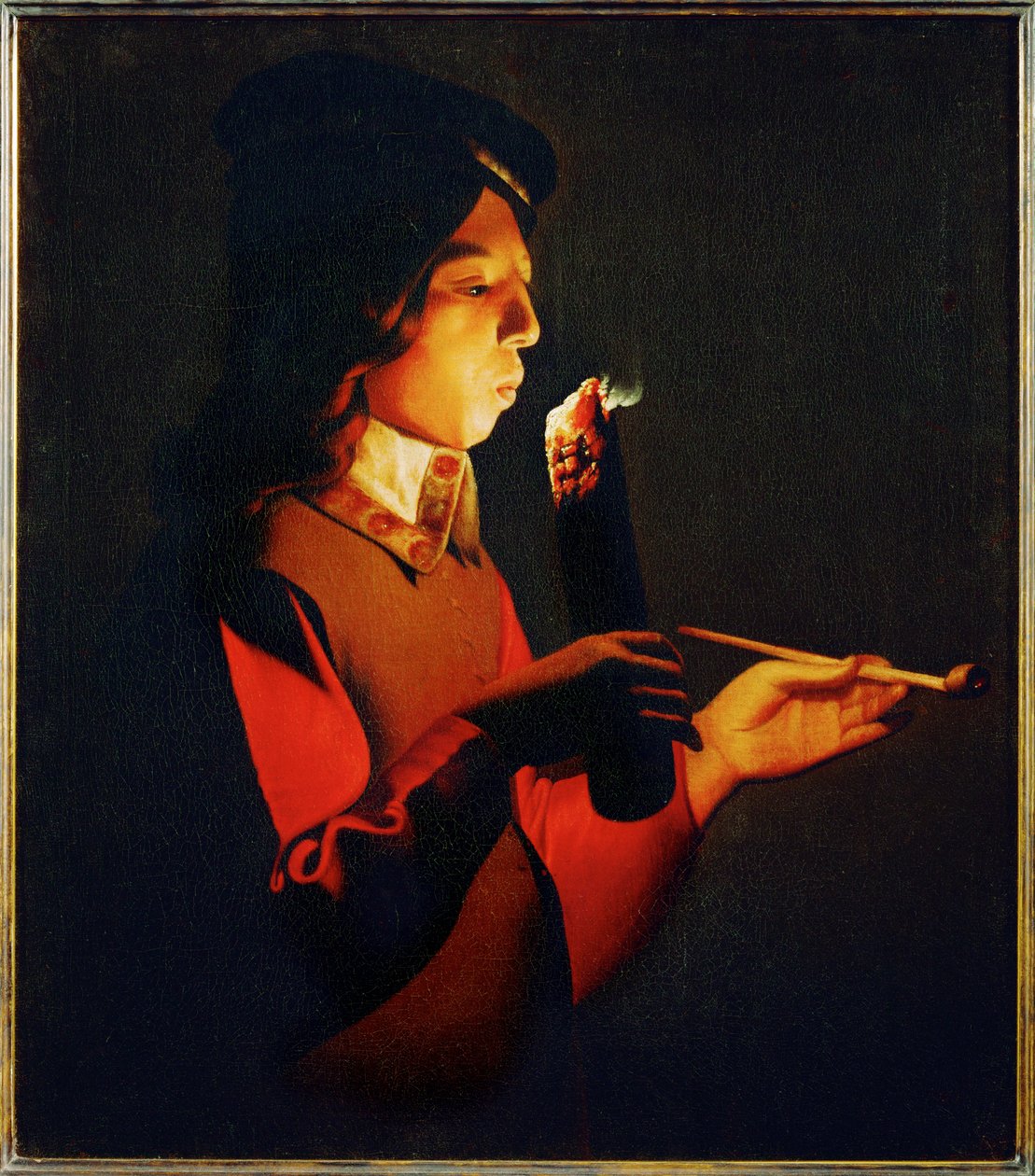 Boy blowingon a Firebrand (maleri på lærred) af Georges de la Tour