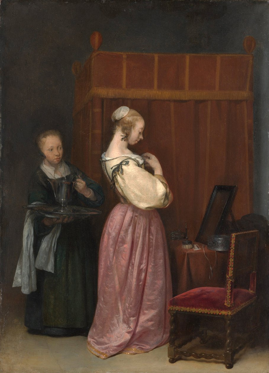Ung kvinde har sit toilet af Gerard Terborch