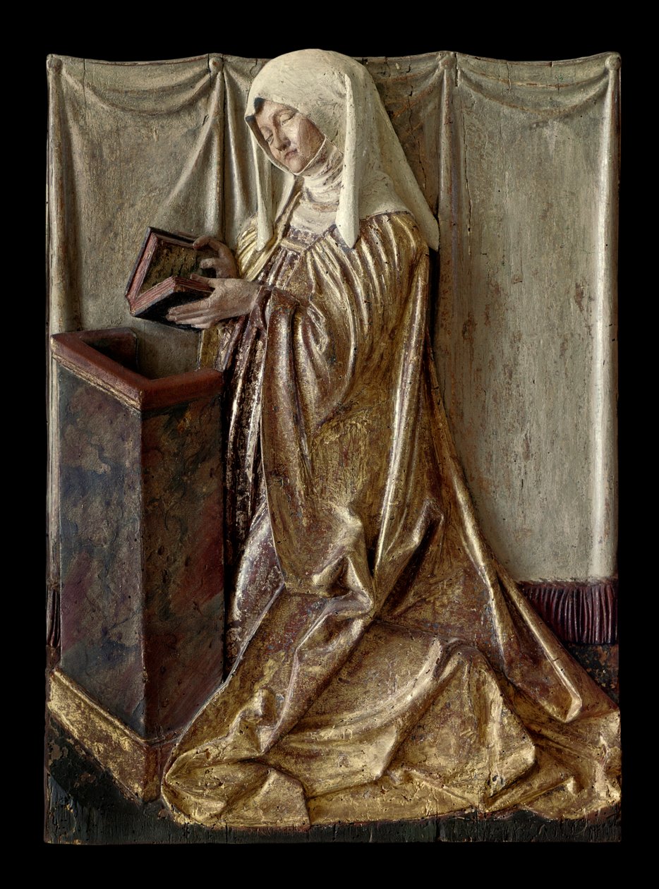 Knælende donor Fragment af udskåret altertavle i polykromt træ. Fra Schwaben. 1520 ca. Paris, Louvre-museet af German School