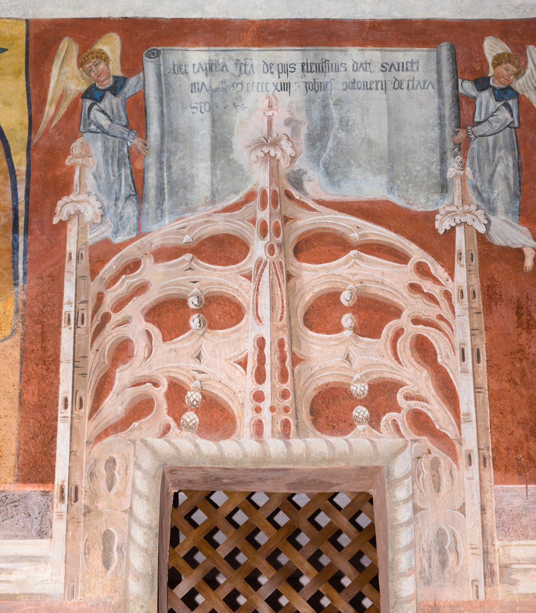 Botoneris dedikationsinskription "Dette kapel i San Magno blev bygget med hengivne almisser doneret af Giovanni di Cherasco Botoneri