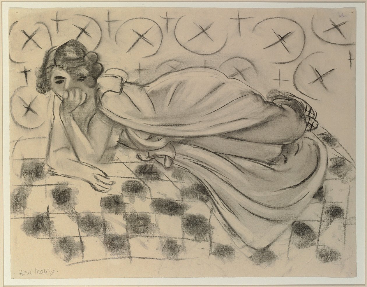 Draperet figur liggende på en sort ternet sofa af Henri Matisse