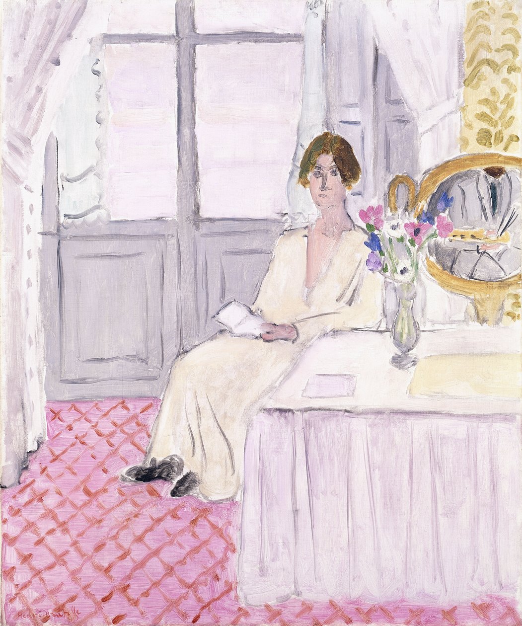 Kvinde læser foran et bord og en buket, Nice af Henri Matisse