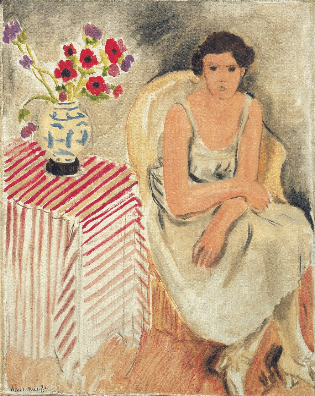 Kvinde på en stol - Blomster på bordet, eller nelliker af Henri Matisse