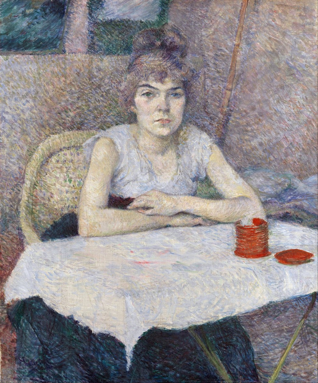 Ung kvinde ved et bord af Henri de Toulouse Lautrec