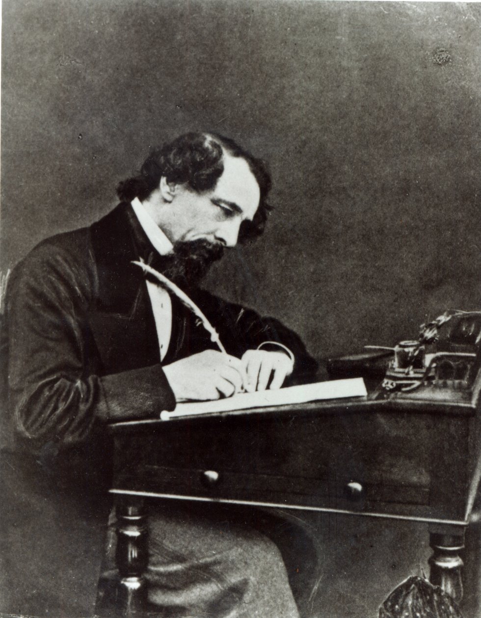 Charles Dickens (1812-70) ved sit skrivebord, 1858 af Herbert Watkins
