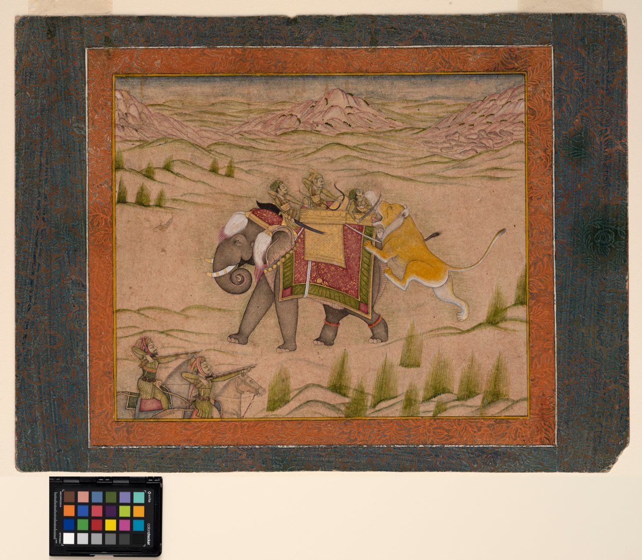 En løve angriber et jagtselskab på toppen af en elefant, ca. 1810 (ugennemsigtig akvarel og guld på papir) af Indian School
