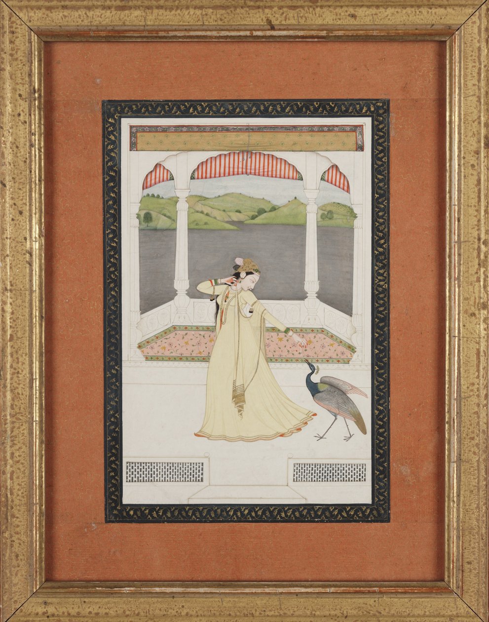 Dame lokker en påfugl med en perlestreng, ca. 1800 (gouache og guld på papir) af Indian School