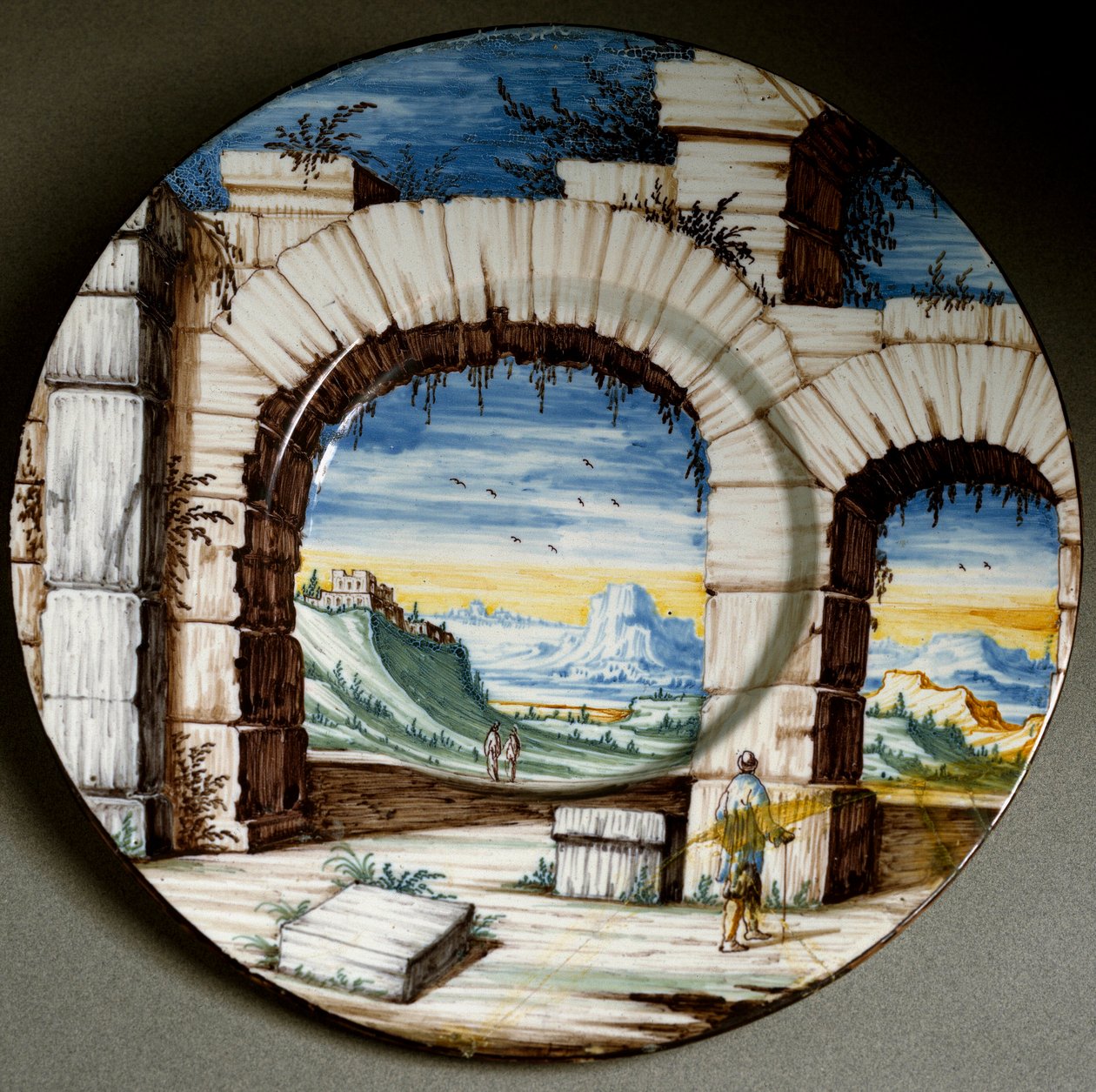 Ruin og landskab. Keramisk plade produceret i Angarano, Italien. Omkring 1650 Firenze, Museo Nazionale del Bargello af Italian School