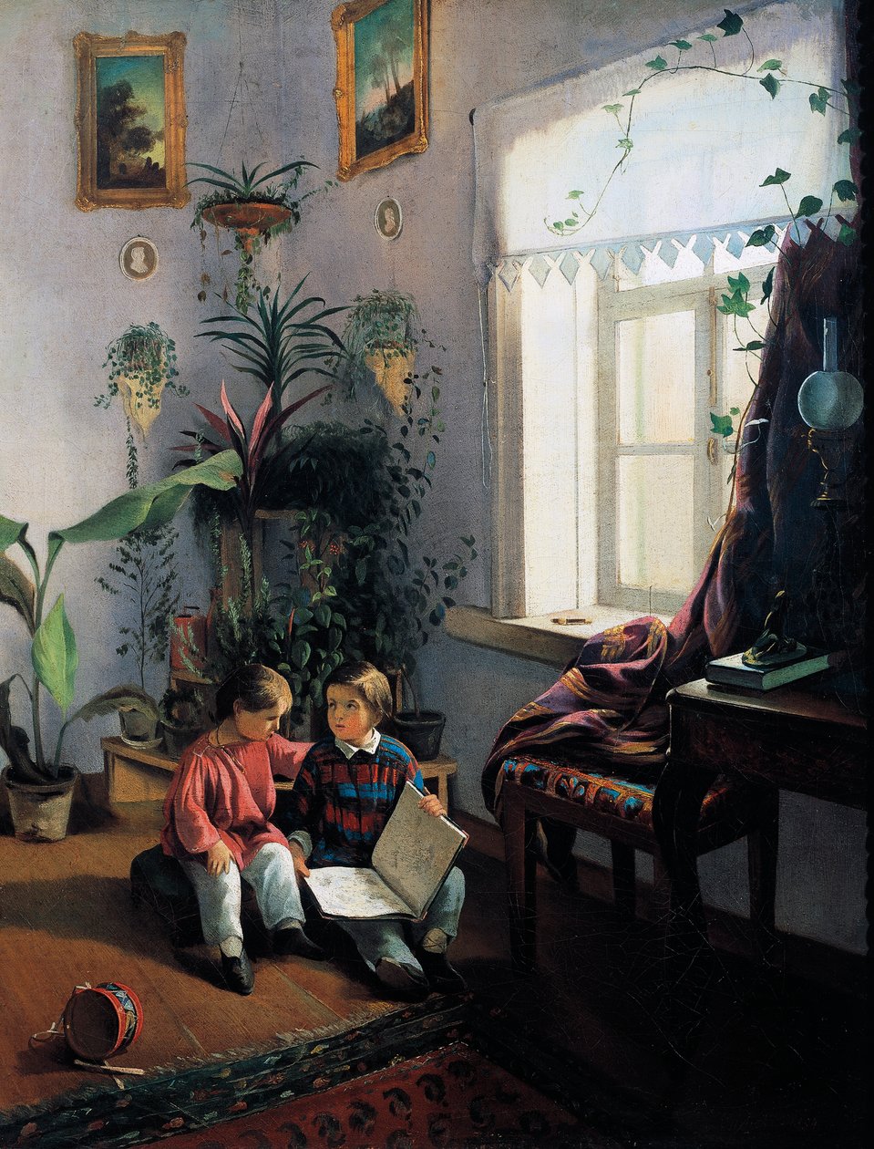 Børn, der gennemser billedbog af Ivan Khrutsky