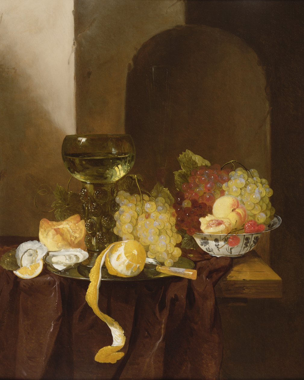 Et stilleben med frugt, en skrællet citron og en rogn på en afsats af Jacques de Claeuw