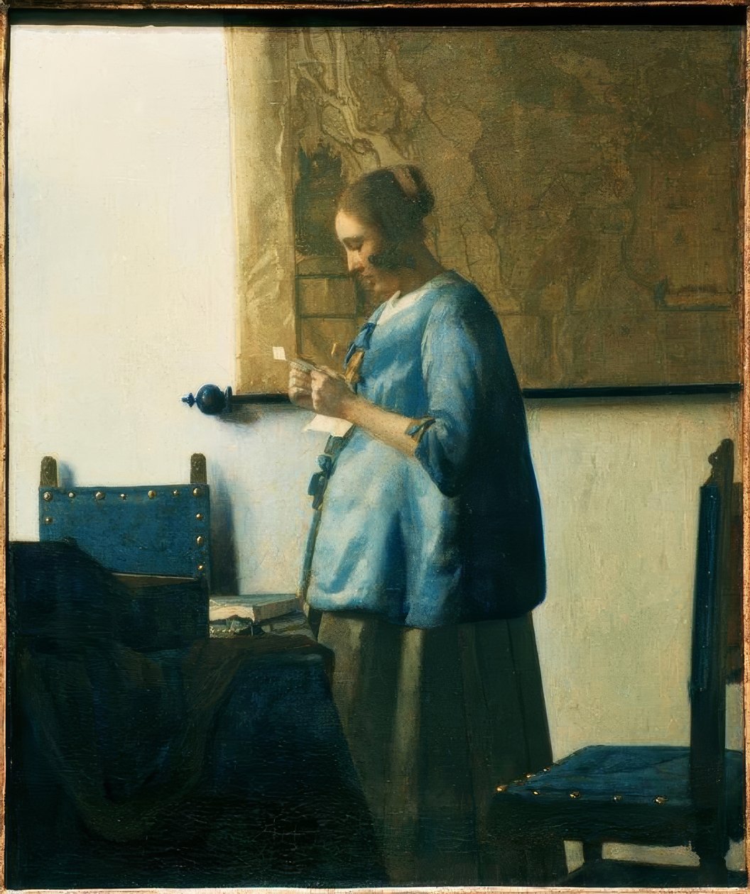 Brevlæser i blåt af Jan Vermeer van Delft