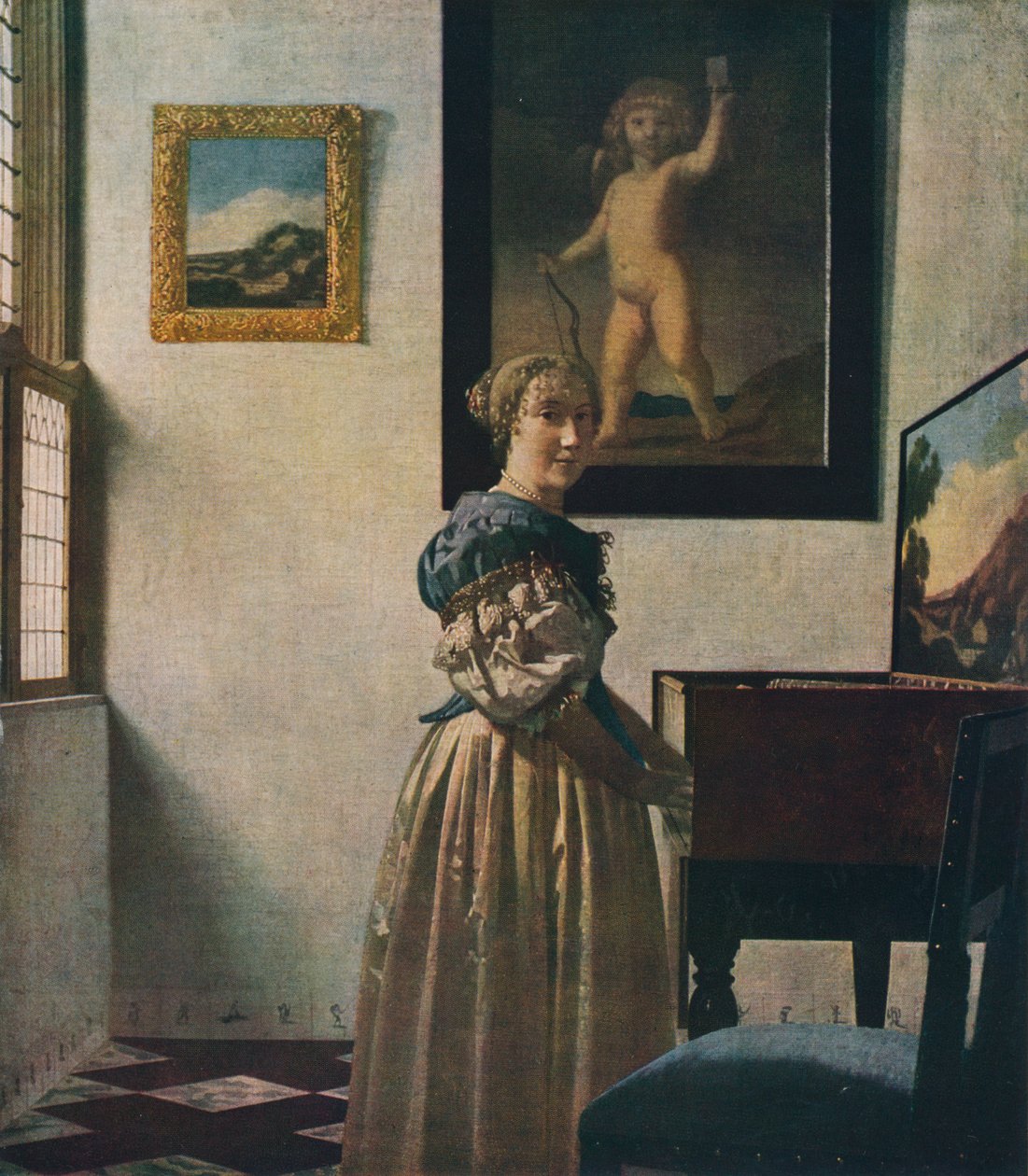 En ung kvinde, der står ved en jomfru, omkring 1670-1672 af Jan Vermeer van Delft