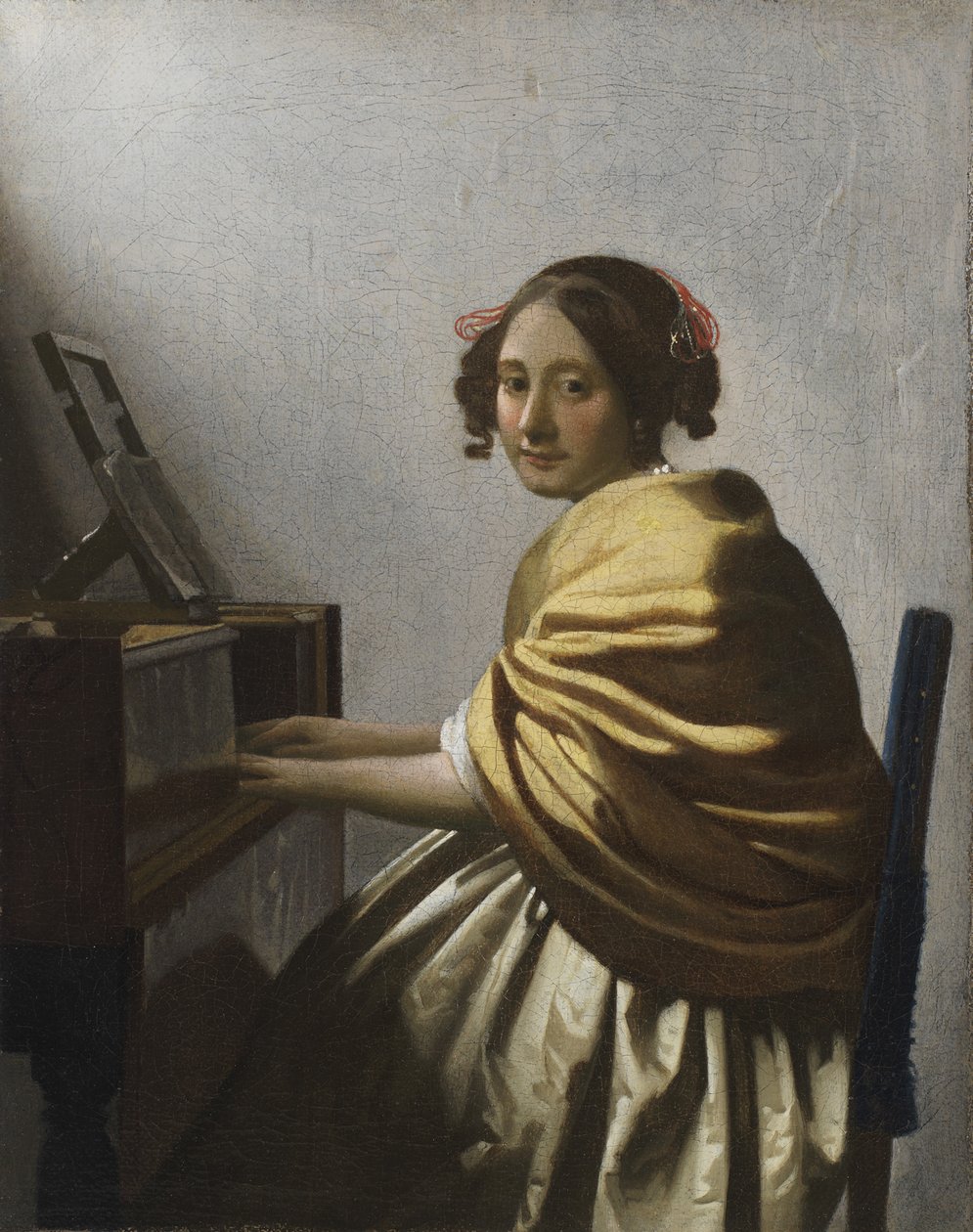 En ung kvinde siddende hos en Virginal, ca. 1670 af Jan Vermeer van Delft