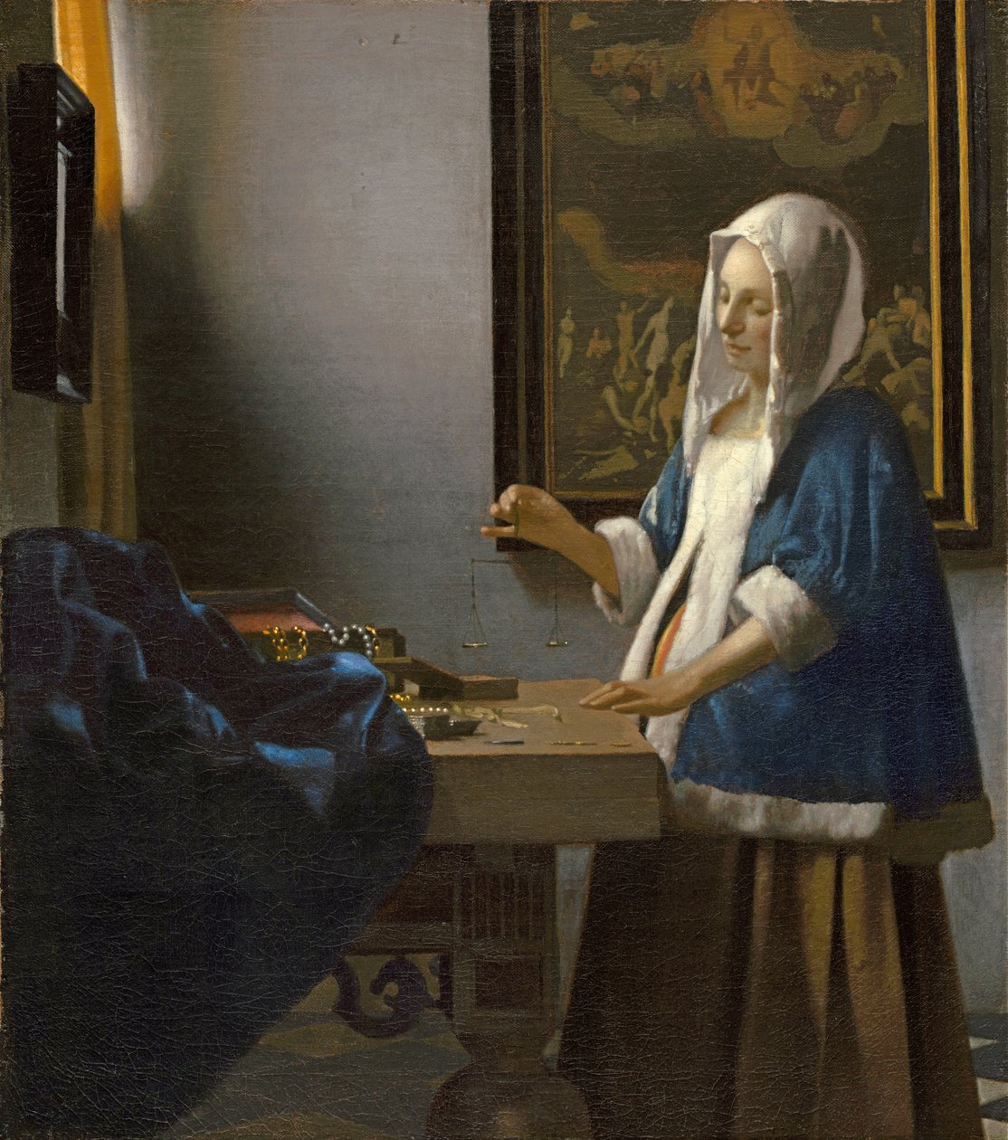 Kvinde holder en balance af Jan Vermeer van Delft