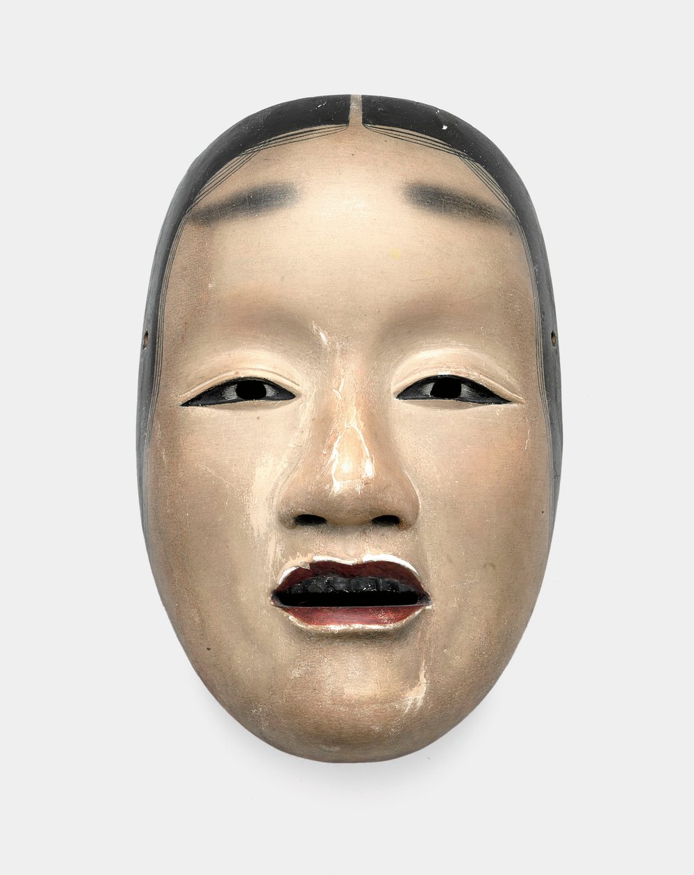 En træmaske med gofun jord, malet med sumi til hår, øjne og tænder og rød til læberne af Japanese School
