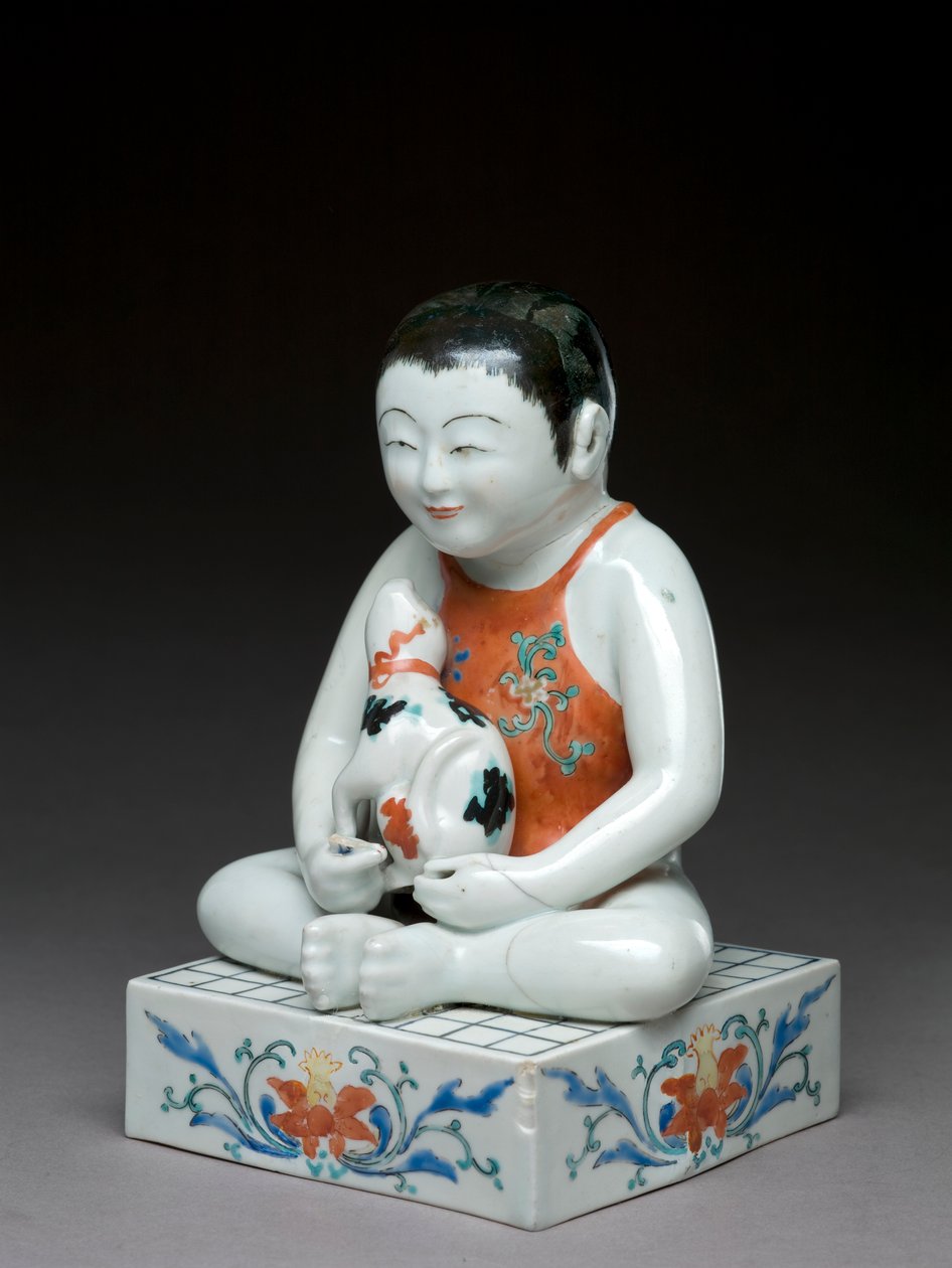 Dreng med en hund, der sidder på et firkantet shogibord, Kakiemon-relateret ware, japansk, 1680-1700 (lertøj med blå underglasur) af Japanese School