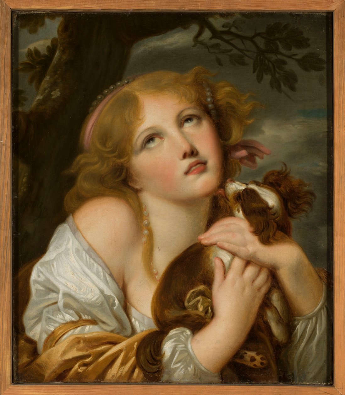 Pige med en hund i armene af Jean-Baptiste Greuze