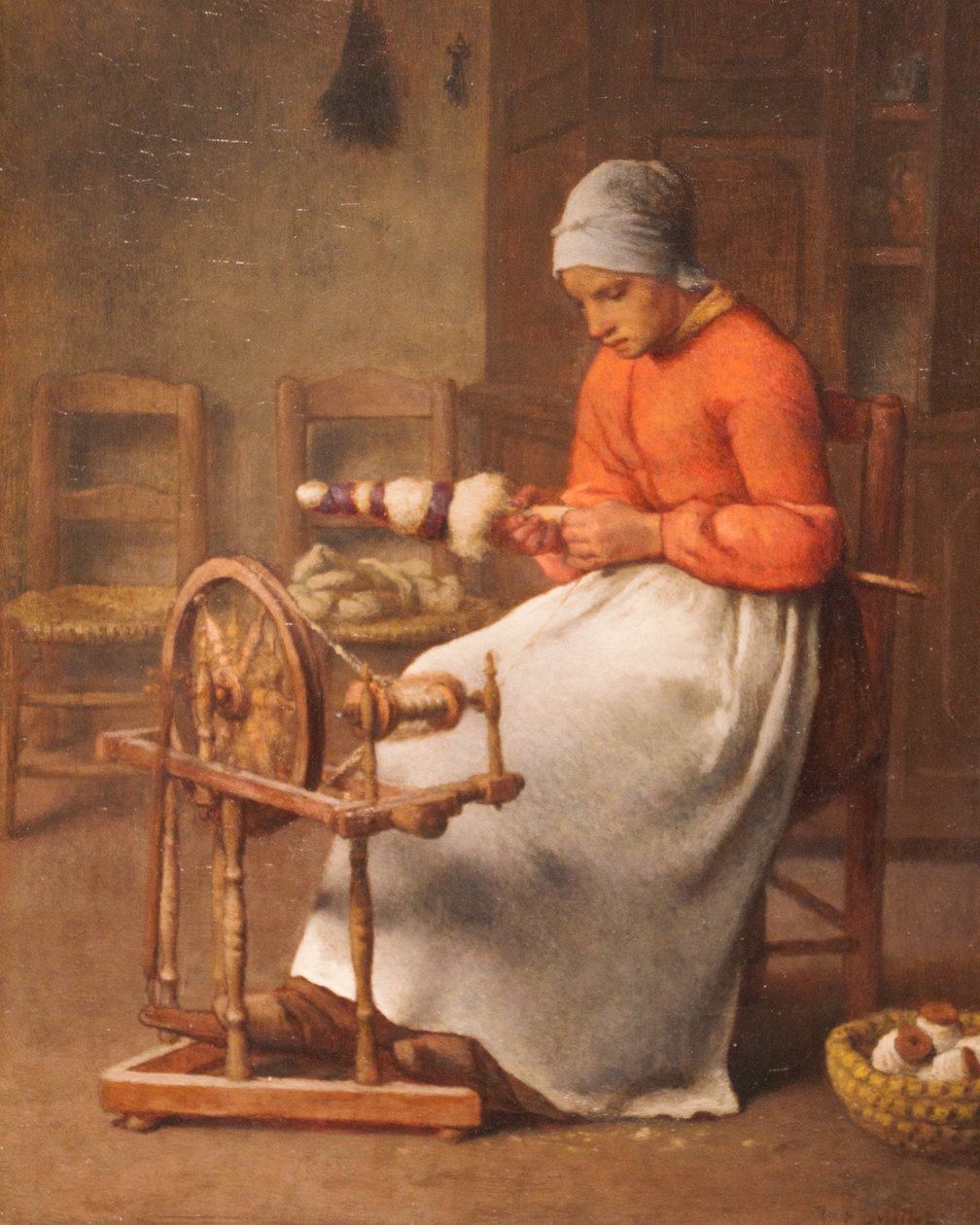 Kvinde, der spinder af Jean Francois Millet