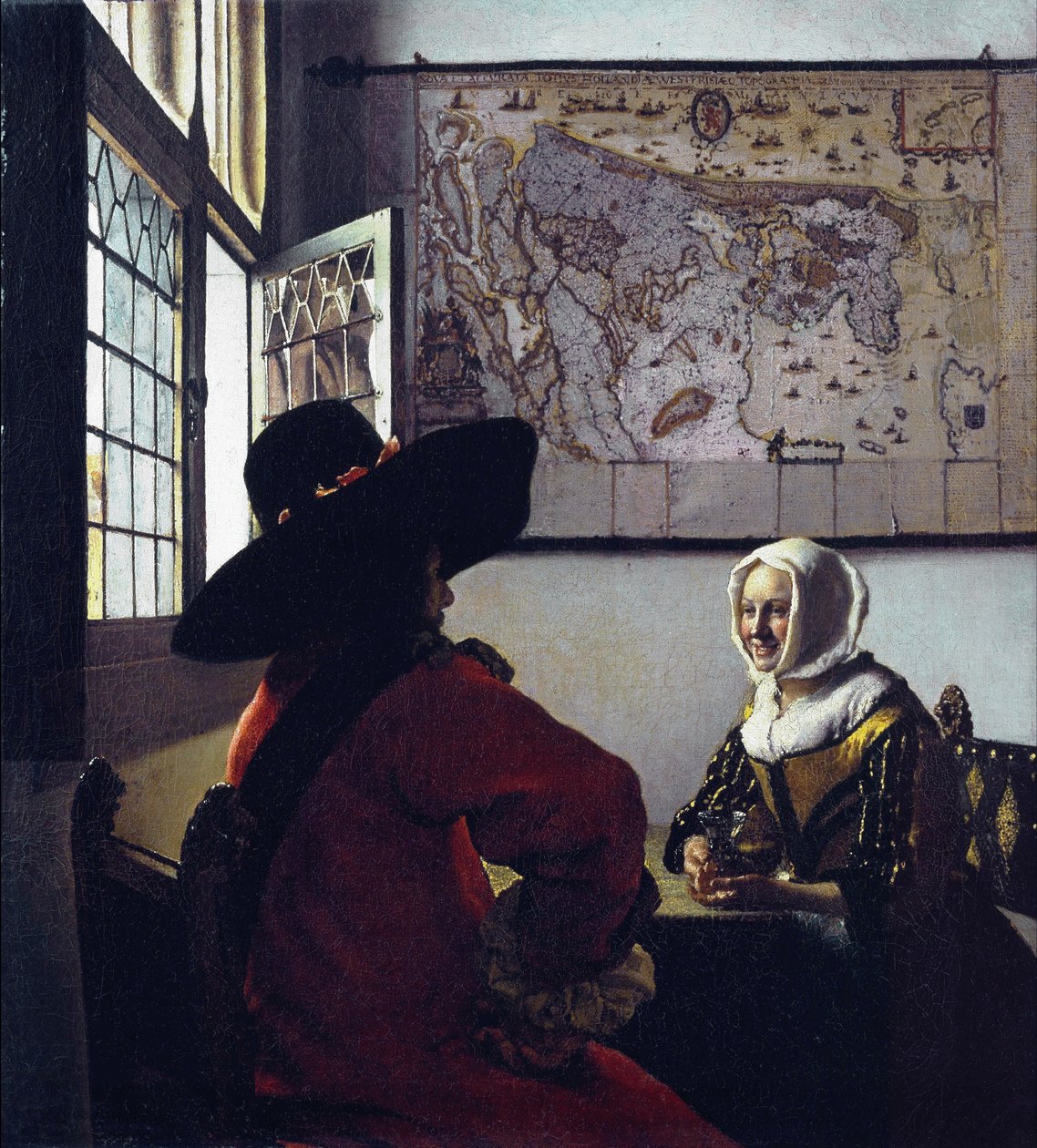 Betjent og en grinende pige af Jan Vermeer van Delft