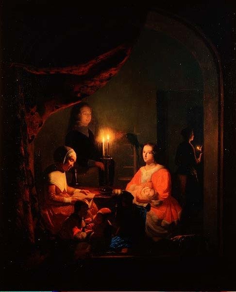 En familie i et indre med stearinlys af Johannes Rosiere