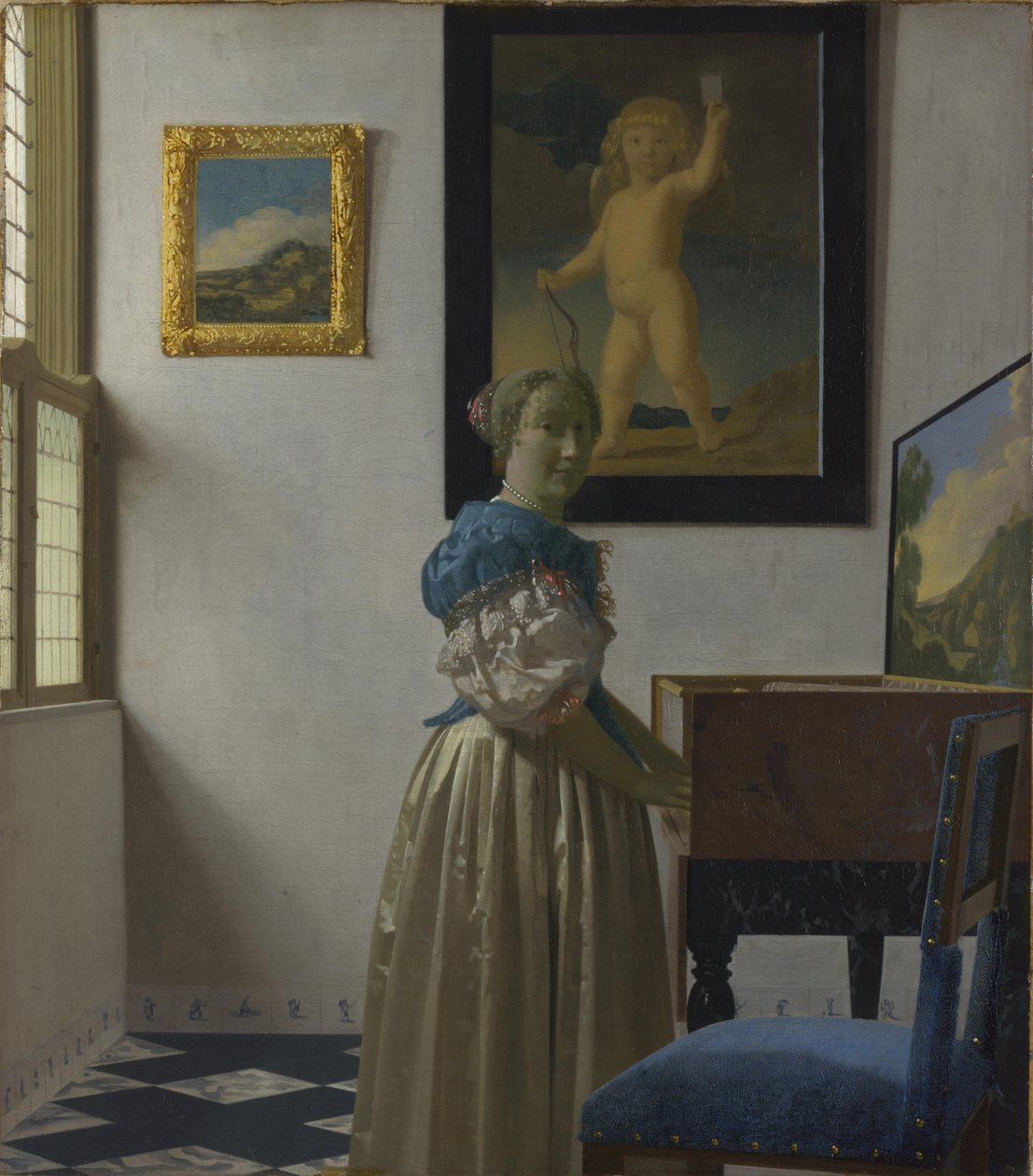 En ung kvinde står ved en jomfru af Johannes Vermeer