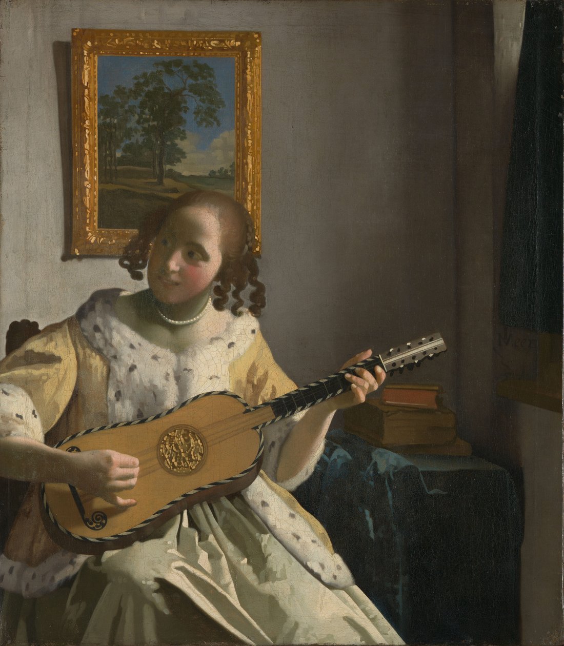 Ung kvinde spiller guitar[1].
Alternativ(e) titel(r):  

Guitarspilleren[2]. af Johannes Vermeer
