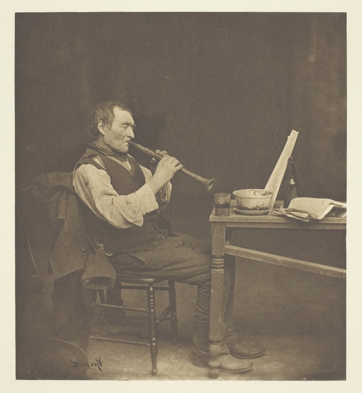 Klarionetspiller, ca. 1897. af John E. Dumont