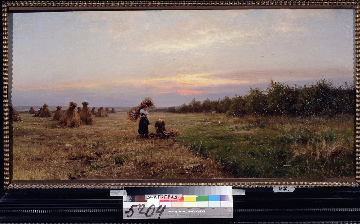 Høst i aftenlyset. (Høst i Aftenlyset). To kvinder, der arbejder på en mark fuld af høstakke. Maleri af Iosiph Evstafievich Krachkovsky (1854-1914), olie på lærred af Josef Evstafievich Krachkovsky