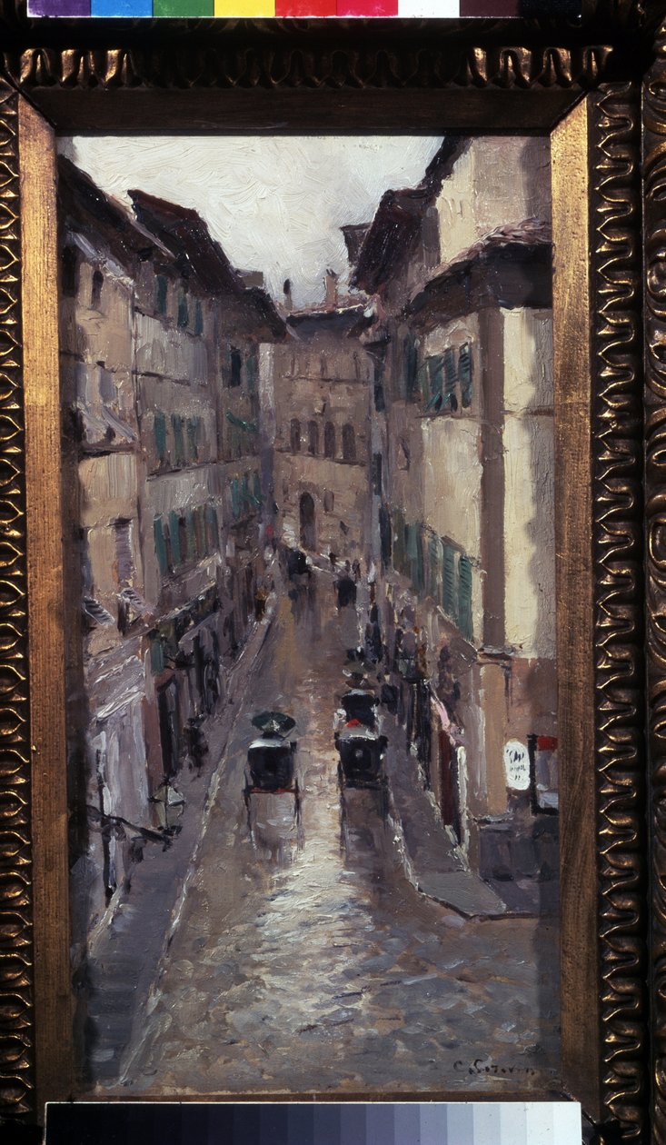 Regn i Firenze (Regn i Firenze). Beskrivelse af en gade i det middelalderlige centrum af byen Toscana (Italien). Maleri af Konstantin Alexeyevich Korovin (Constantin Korovin) (1861-1939), olie på lærred af Konstantin Alekseevich Korovin