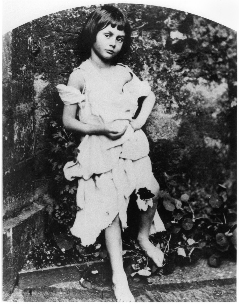 Alice Pleasance Liddell (1852-1934) som tiggerpige af Lewis Carroll