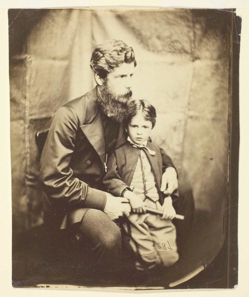 Pastor James Langton Clark og søn Charles (Robin) af Lewis Carroll