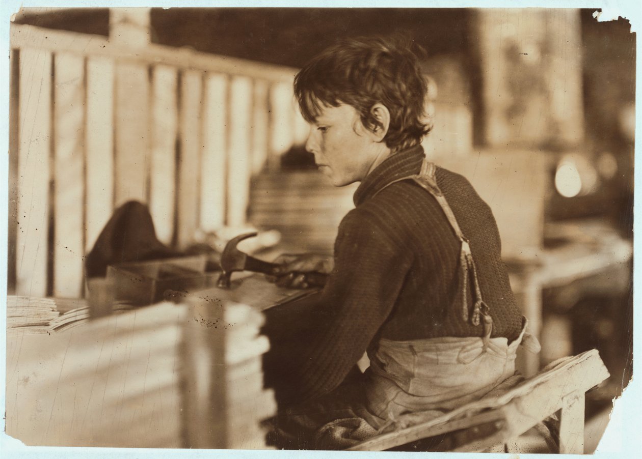 Dreng laver kurve til meloner i Evansville, Indiana, 1908 af Lewis Wickes Hine