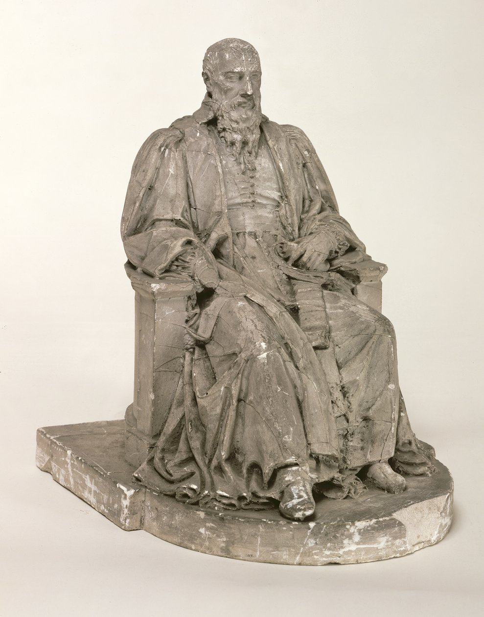 Siddende statue af Michel de L