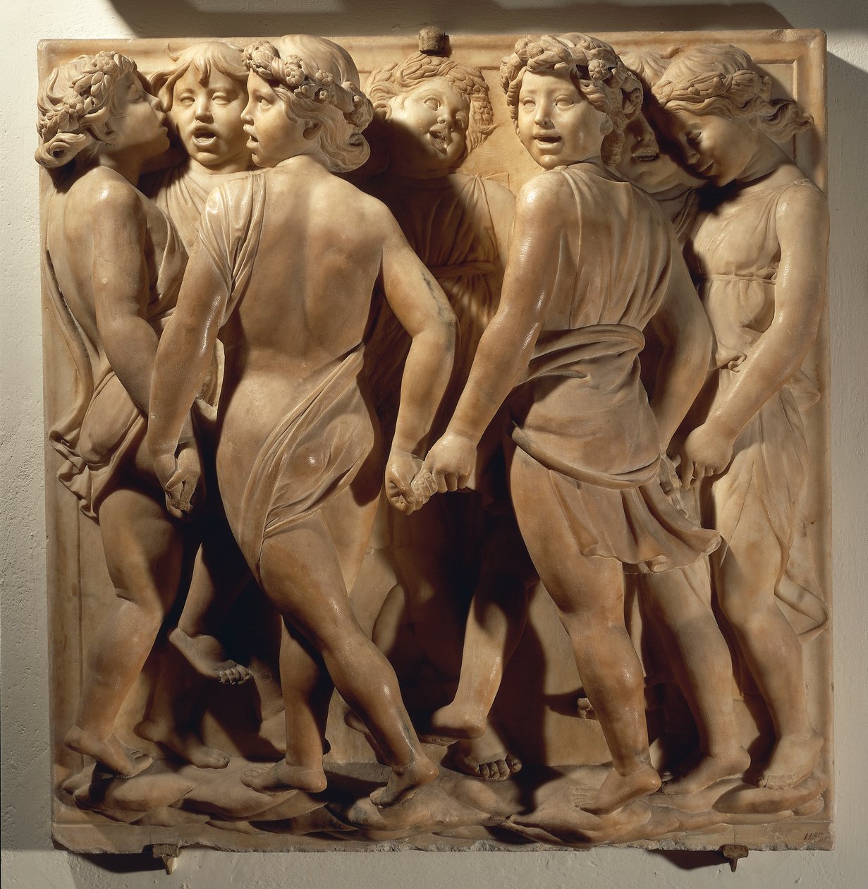 Lov ham i koret (Salme 150, Lov Herren), panel med drenge, der synger og danser i ring af Luca Della Robbia